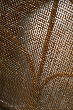Close-up of a woven brown fabric texture