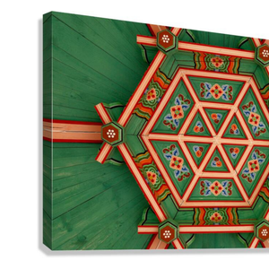 Decorative ceiling with Dancheong geometric patterns in Seoul, South Korea patterns on a green background