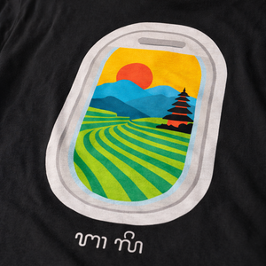 Illustration of a scenic Bali rice fields view with a sun, mountains, and fields on a black background.