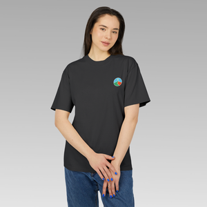 Person wearing a black t-shirt with Mindful Yesmads logo on a gray background